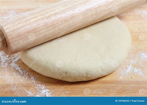 Rolling Pizza Dough Stock Images - Image: 18790294