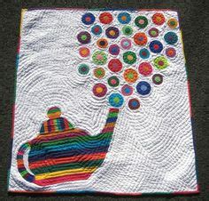 A magic teapot quilt. Patchwork plus regular and reverse applique were ...