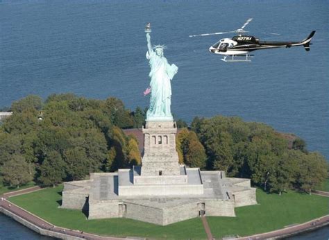 The Statue of Liberty. | Helicopter tour, Helicopter ride, New york tours