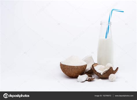 Coconut milk and nut — Stock Photo © alebloshka #152785072