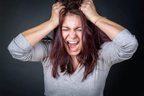 How to Deal With Anger and Rage During Divorce - Divorced Girl Smiling