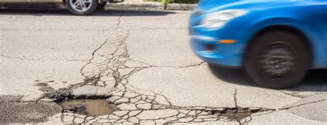 Five Driving Tips to Avoid Pothole Damage to Your Car