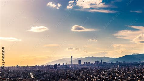 Tehran skyline in a beautiful cloudy day with golden hour light Tehran ...