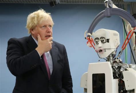 Britain's Johnson meets high-tech robots in Japan
