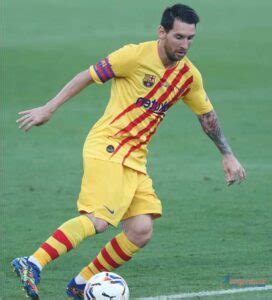 Lionel Messi in Yellow Barcelona Jersey - Sportsman Biography