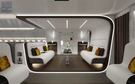 the interior of an airplane with couches and pillows