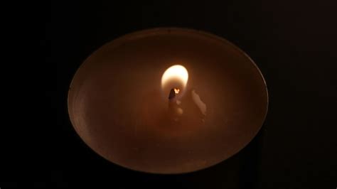 Candle flame burning close up 20436099 Stock Video at Vecteezy