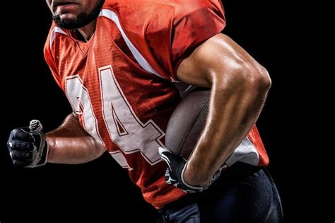 Premium Photo | A football player wearing a red jersey with the number ...