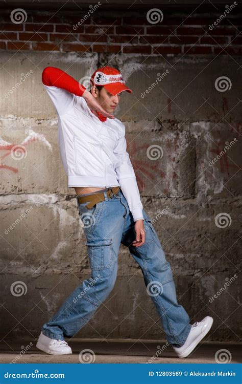 Hip Hop Boy Dancing in Modern Style Over Grey Wall Stock Image - Image of casual, adult: 12803589