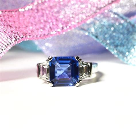 Square Cut Sapphire with Trapeze Cut Diamonds - Hancocks Jewellers