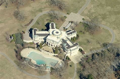 Rick Ross Buys Evander Holyfield’s Former Fayetteville Mansion ...