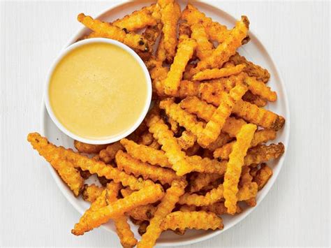 Seasoned Fries with Cheese Sauce Recipe | Food Network Kitchen | Food Network