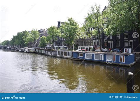 Boat houses in Amsterdam editorial photo. Image of living - 119021851