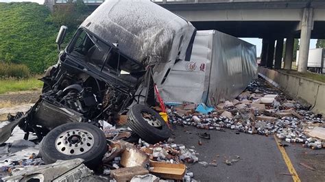 Semi-truck crash on I-5 exit ramp sends driver to hospital, spills Gatorade onto road | kgw.com