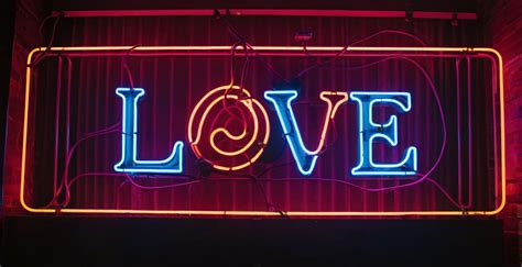 A Neon Sign With A LOVE Free Stock Photo - Public Domain Pictures