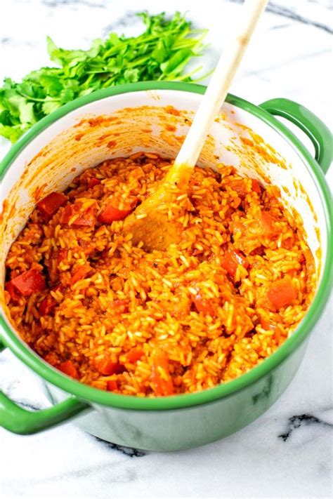 Easy and packed with amazing flavors: this Jollof Rice is budget friendly and so easy to prepare ...