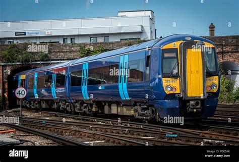 Class 375 passenger train in Southeastern livery travelling past ...