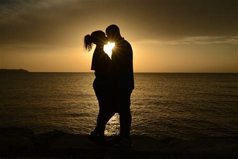 Silhouette photo of couple kissing near body of water HD wallpaper ...