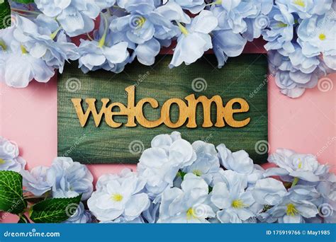 Welcome Sign and Flower Blooming Decoration on Pink Background Stock ...