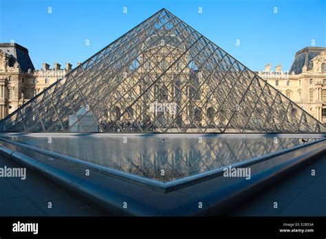 France, Paris, the Pyramide of the Louvre by architect Ieoh Ming Pei, the Richelieu wing in the ...