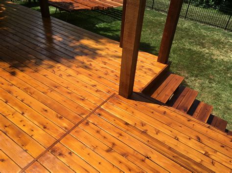 Two tone cedar deck. Cabot Stain Australian Oil. The posts and railing are getting two coats of ...