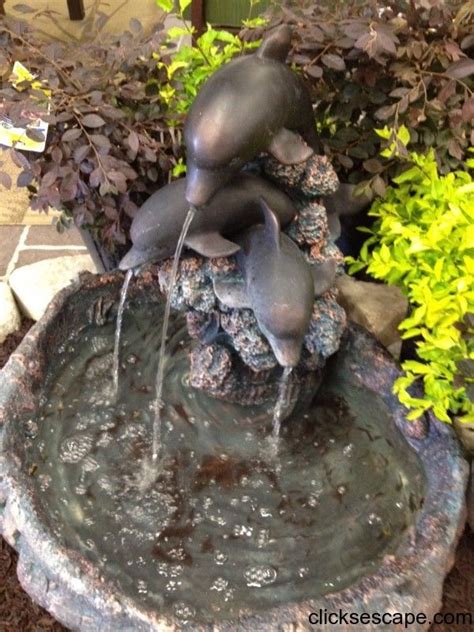 Dolphin water fountain | Backyard water fountains, Water fountains ...