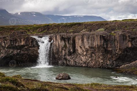 Landscape with waterfall in Iceland 783803 Stock Photo at Vecteezy