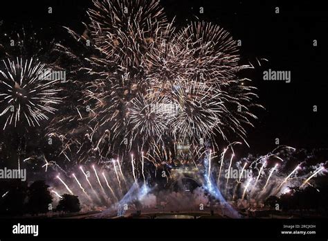 Fireworks light the Eiffel Tower during the Bastille Day celebrations ...