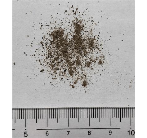 A photograph of the Mars soil simulant. The unit of number on the scale... | Download Scientific ...