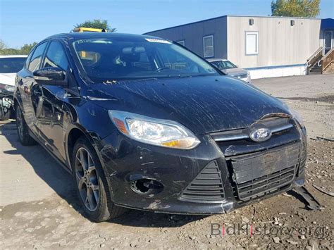 Report 1FADP3K21EL337866 FORD FOCUS SE 2014 BLACK GAS - price and damage history