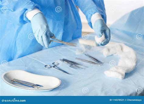 Surgeon with tools stock image. Image of clippers, gloves - 116578521