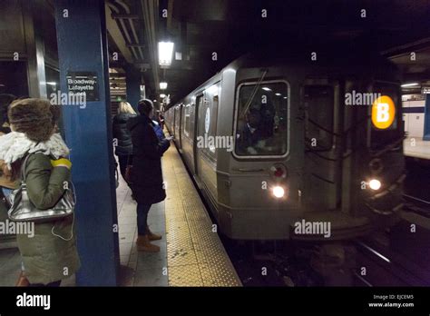 passengers on the New York City subway B train at Broadway-Lafayette ...