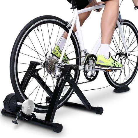 The stationary bike stand's noise reduction resistance wheel works to reduce the hum generated ...