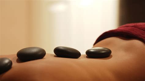 Benefits of Hot Stone Massage - Massage Aha!