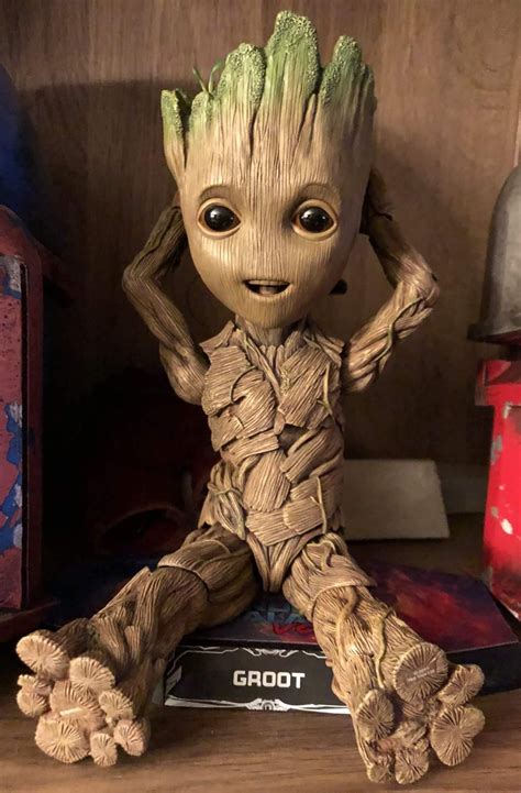 Adorable Groot Figurine on Book