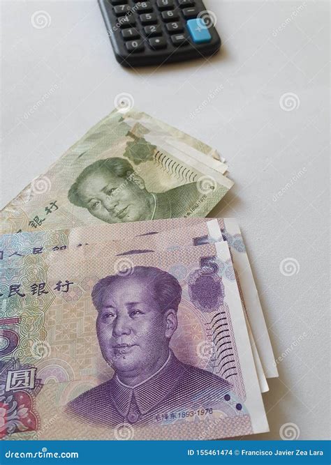 Chinese Banknotes of Different Denominations and Calculator on White ...