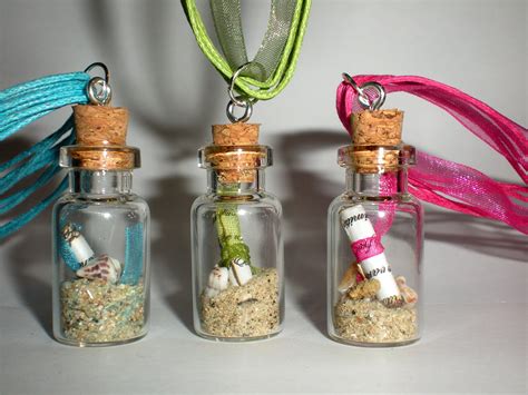 Mini message in a glass bottle necklace with cork / sand and sea shells ...