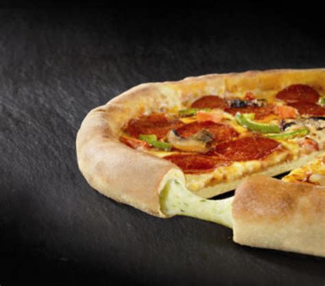 GET STUFFED! DOMINO’S STUFFED CRUST(TM) SET TO TAKE PIZZA LOVERS BY STORM