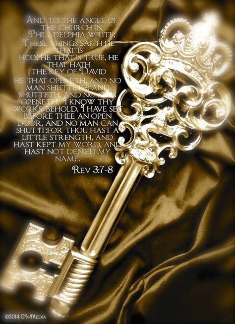 a golden key with the bible verse on it