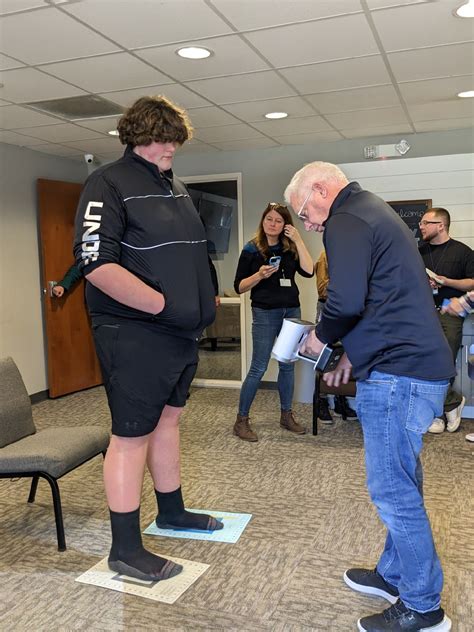 Eric Kilburn, HS freshman, gets size 23 shoes to help him play football