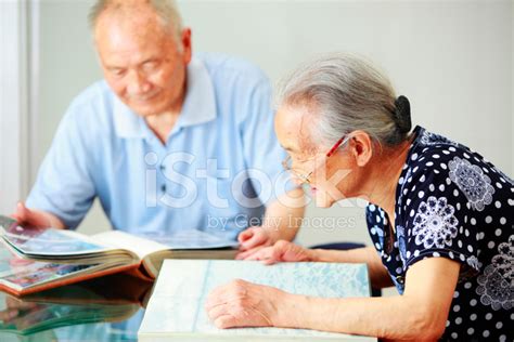 Grandparents Reading Book Together Stock Photo | Royalty-Free | FreeImages