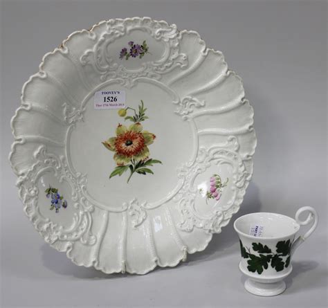 A Meissen porcelain plate, early 20th Century, painted with a flower ...