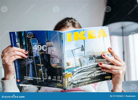 Reading IKEA Catalogue editorial image. Image of blue - 51129360