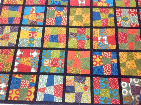 Wonky Nine Patch quilt made in one of my workshops by Debbie!!! I quilted it with "Circles ...