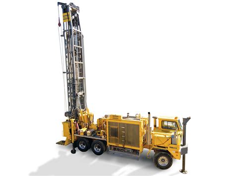 a yellow truck with a crane on the back of it's cab is shown in front of a white background