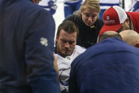 Lightning's Mikhail Sergachev gets emotional after breaking his leg in ...