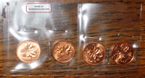 Four Uncirculated Canadian Copper Pennies - All Different