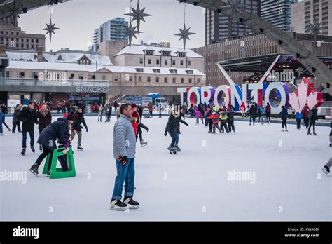 toronto nathan phillips square winter people skating Stock Photo - Alamy