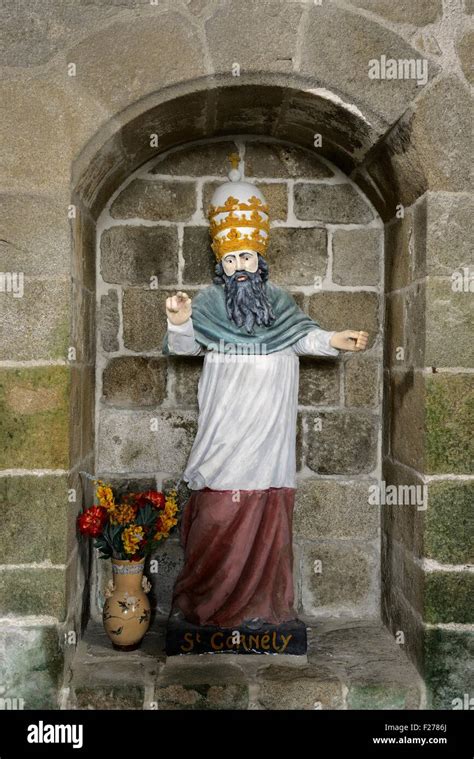 Saint Columban’s Chapel. Village of Saint-Columban, Brittany, France. Statue of Saint Cornely ...