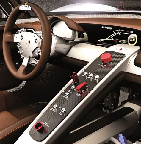 the interior of a modern car with steering wheel and dashboard controls, including an instrument